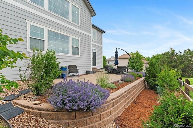 5984 S Paris Pl, Greenwood Village, CO 80111 - view of home's exterior featuring a patio area