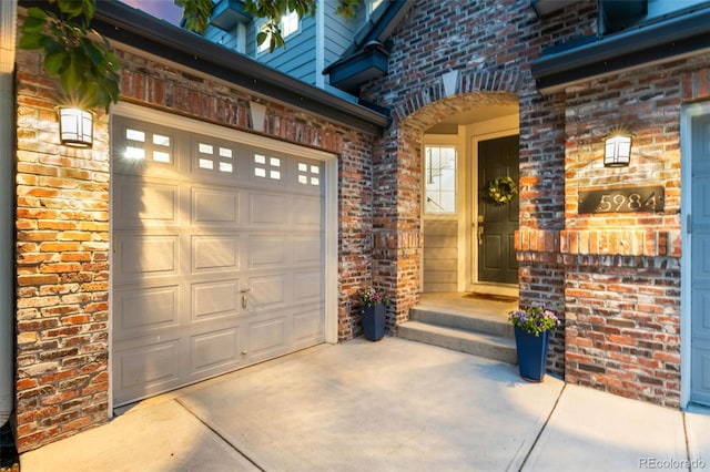 5984 S Paris Pl, Greenwood Village, CO 80111 - property entrance featuring brick siding and driveway