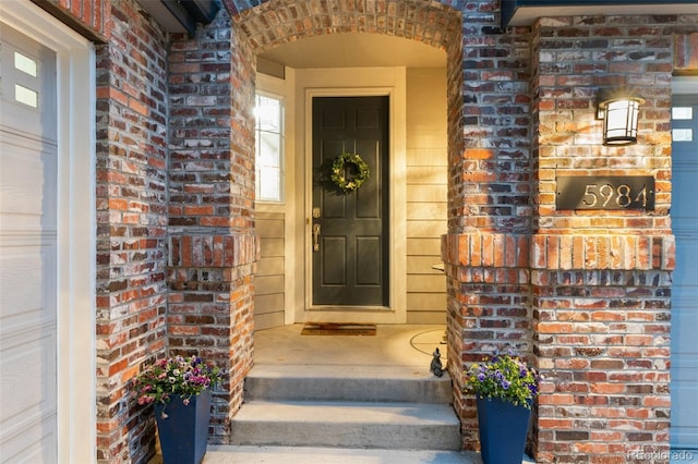 5984 S Paris Pl, Greenwood Village, CO 80111 - view of exterior entry featuring brick siding