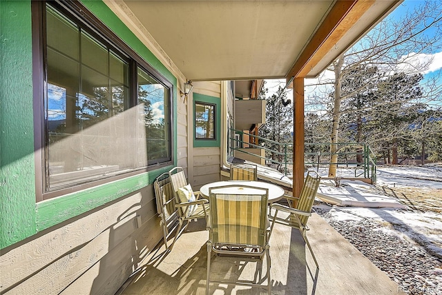 view of snow covered patio