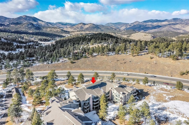 drone / aerial view featuring a mountain view