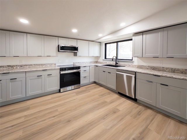 4476 S Grant St, Englewood, CO 80113 - kitchen featuring recessed lighting, gray cabinetry, stainless steel appliances, and a sink