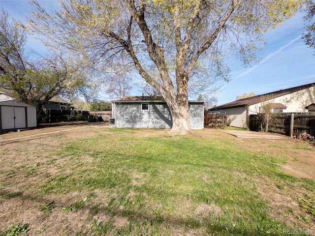 4476 S Grant St, Englewood, CO 80113 - view of yard featuring fence, an outdoor structure, and a shed