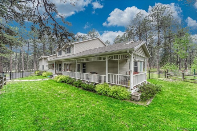 18470 Canterbury Dr, Monument, CO 80132 - view of front of home featuring covered porch and roof with shingles