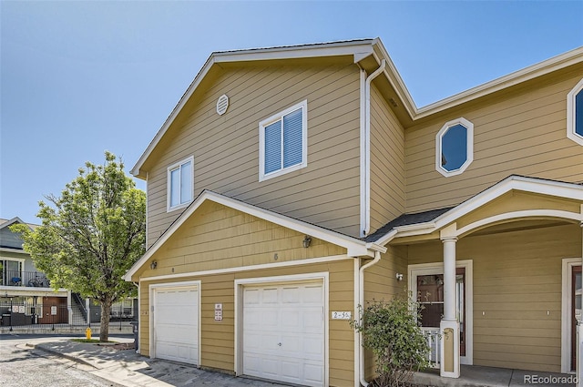 3200 S Federal Blvd Unit 5, Denver, CO 80236 - view of property featuring an attached garage