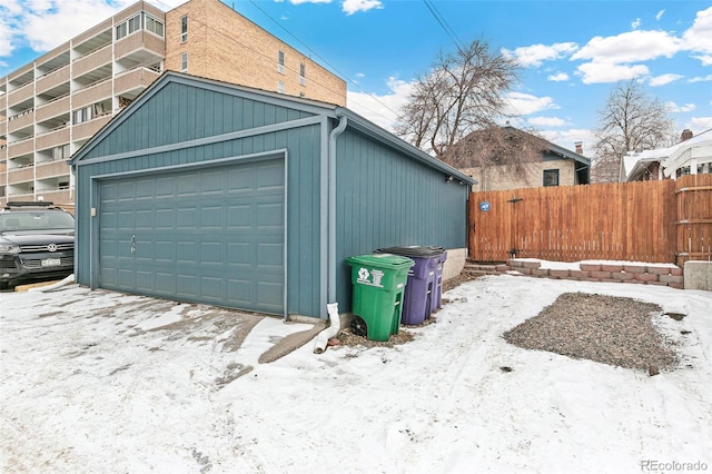 view of snow covered garage