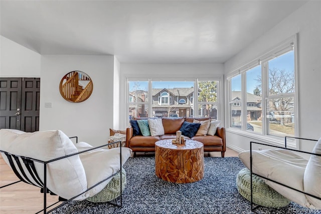 living room featuring baseboards and wood finished floors