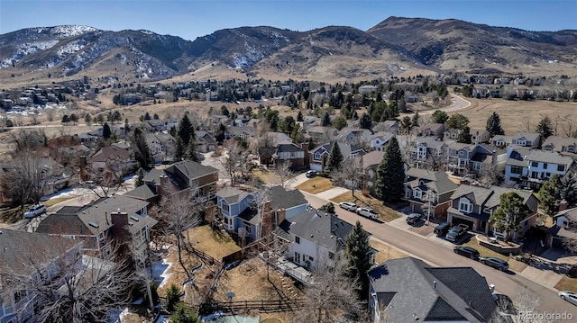 drone / aerial view featuring a mountain view and a residential view