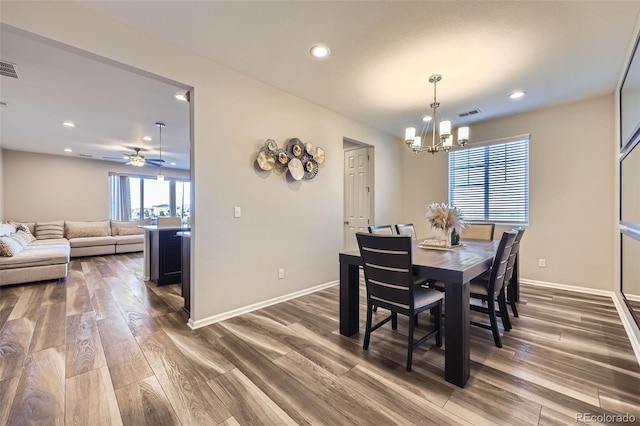 dining area with recessed lighting, visible vents, baseboards, and wood finished floors