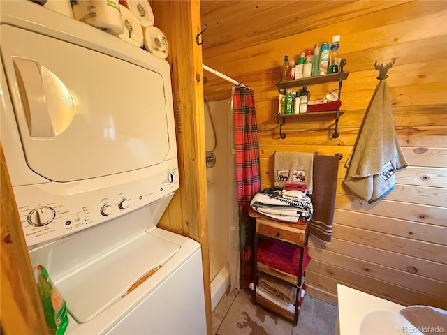179 Mountain Vis, Como, CO 80432 - washroom with stacked washing machine and dryer and wooden walls
