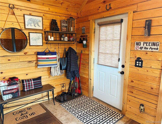 179 Mountain Vis, Como, CO 80432 - mudroom with wooden walls and vaulted ceiling