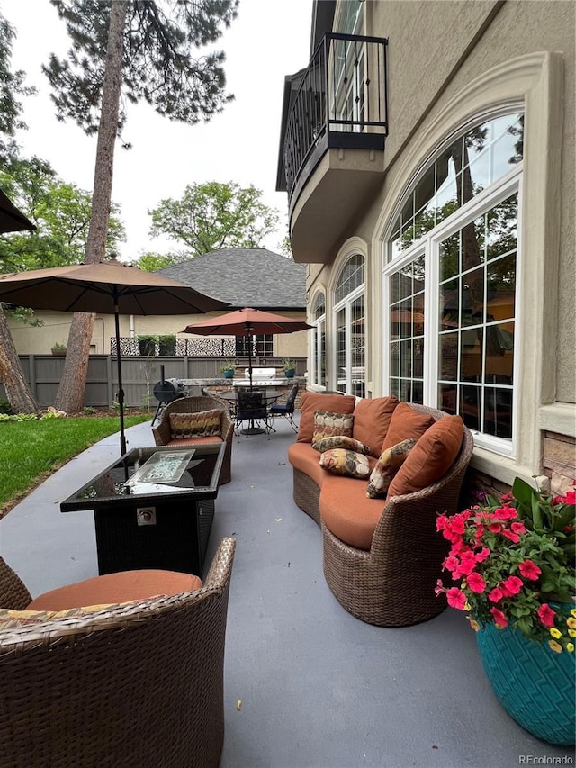 1160 Monaco Pkwy, Denver, CO 80220 - patio / terrace with outdoor dining space, an outdoor living space, and a patio area