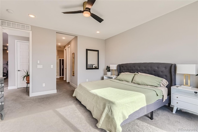 carpeted bedroom with a ceiling fan, recessed lighting, visible vents, and baseboards