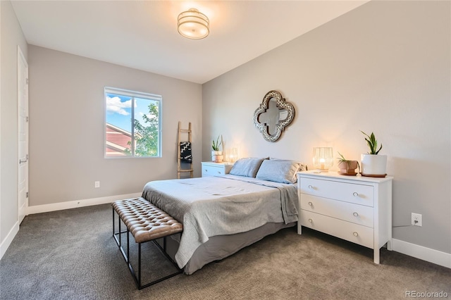 bedroom with carpet and baseboards