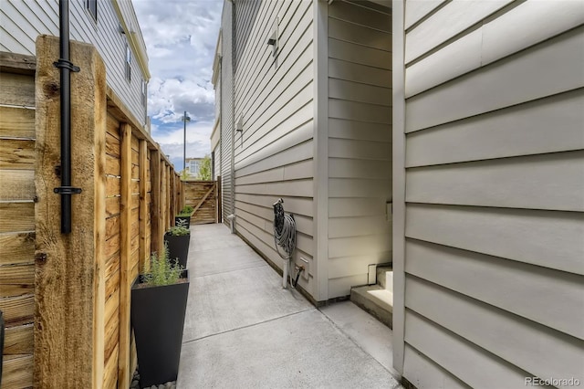 view of home's exterior with fence