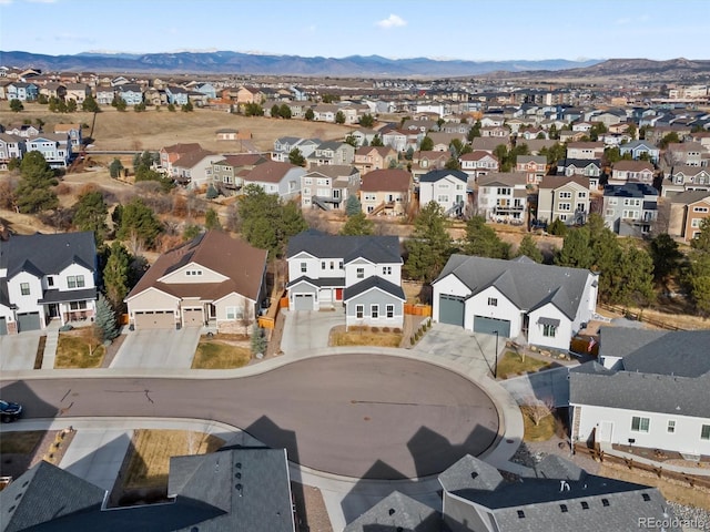 drone / aerial view featuring a mountain view and a residential view