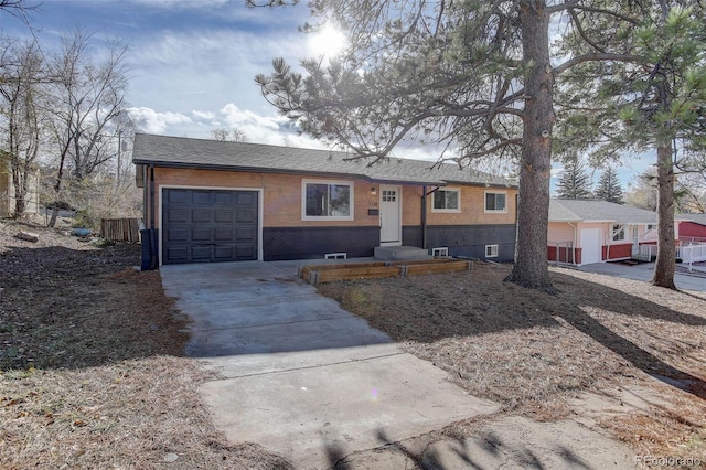 single story home featuring a garage