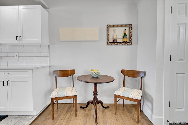 2544 S Raleigh St, Denver, CO 80219 - living area with light wood-type flooring and baseboards