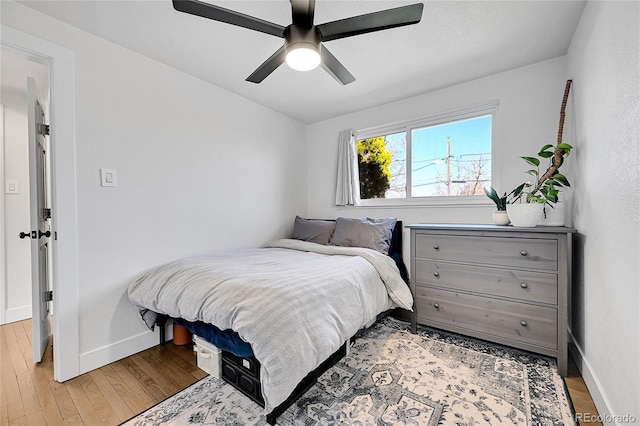 2544 S Raleigh St, Denver, CO 80219 - bedroom featuring light wood-type flooring, baseboards, and a ceiling fan