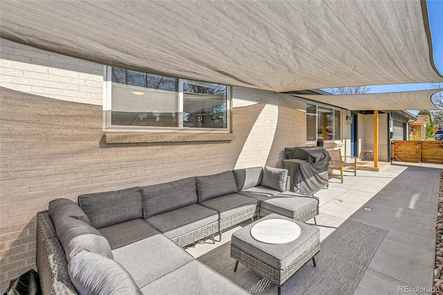 2544 S Raleigh St, Denver, CO 80219 - view of patio with an outdoor living space and a grill