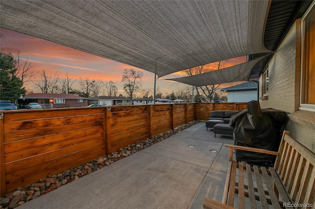 2544 S Raleigh St, Denver, CO 80219 - view of patio with grilling area, fence, and an outdoor hangout area