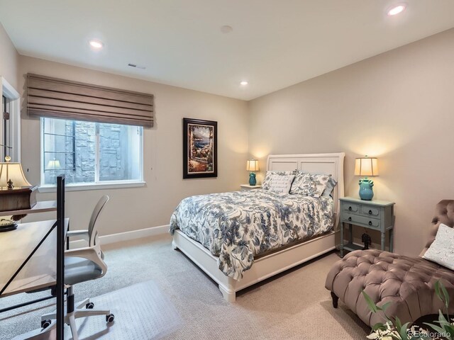 bedroom featuring recessed lighting, carpet, and baseboards