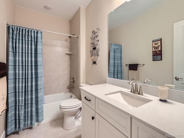 full bathroom featuring tile patterned floors, shower / tub combo, toilet, and vanity