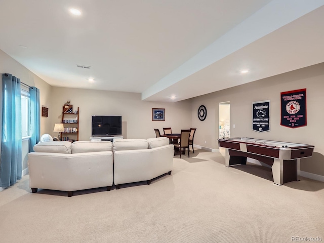 living room featuring recessed lighting, baseboards, visible vents, and light carpet