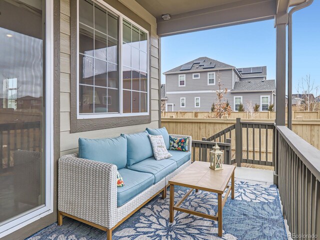 wooden deck featuring outdoor lounge area