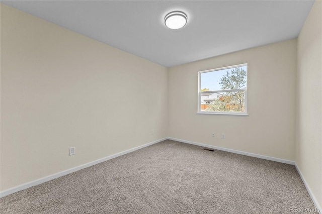 view of carpeted spare room