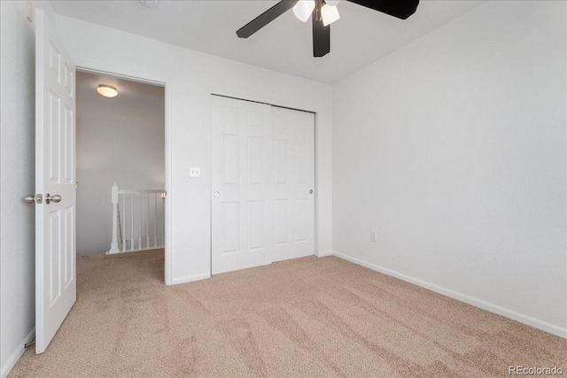 5255 Memphis St Unit 219, Denver, CO 80239 - unfurnished bedroom featuring light colored carpet and ceiling fan