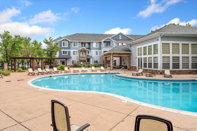5255 Memphis St Unit 219, Denver, CO 80239 - community pool with a patio area