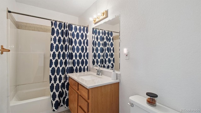766 Fulton Ave, Brighton, CO 80601 - bathroom featuring vanity, a textured wall, and shower / bath combination with curtain