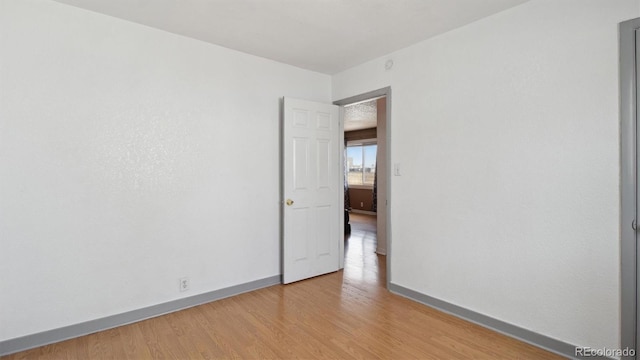 766 Fulton Ave, Brighton, CO 80601 - unfurnished room featuring baseboards and light wood-style floors