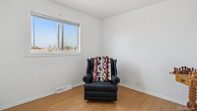 766 Fulton Ave, Brighton, CO 80601 - sitting room with light wood-style flooring and baseboards