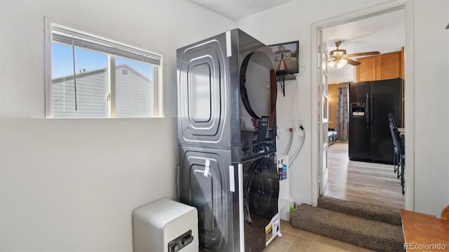 766 Fulton Ave, Brighton, CO 80601 - laundry area featuring stacked washer / dryer and ceiling fan