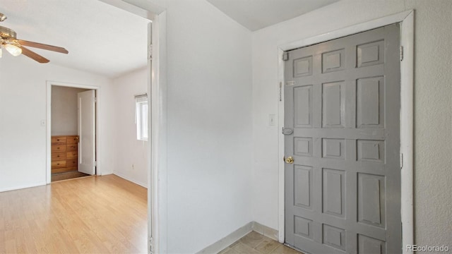 766 Fulton Ave, Brighton, CO 80601 - foyer entrance featuring a ceiling fan, lofted ceiling, and light wood-style floors
