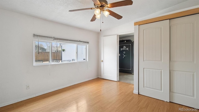 766 Fulton Ave, Brighton, CO 80601 - unfurnished bedroom with light wood-style floors, a closet, and a ceiling fan