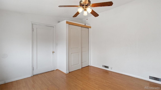 766 Fulton Ave, Brighton, CO 80601 - unfurnished bedroom with light wood-style flooring, a closet, and a ceiling fan