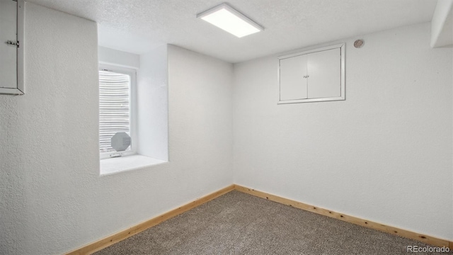 766 Fulton Ave, Brighton, CO 80601 - unfurnished room featuring carpet and a textured ceiling