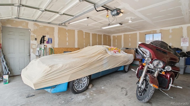 766 Fulton Ave, Brighton, CO 80601 - garage featuring a garage door opener