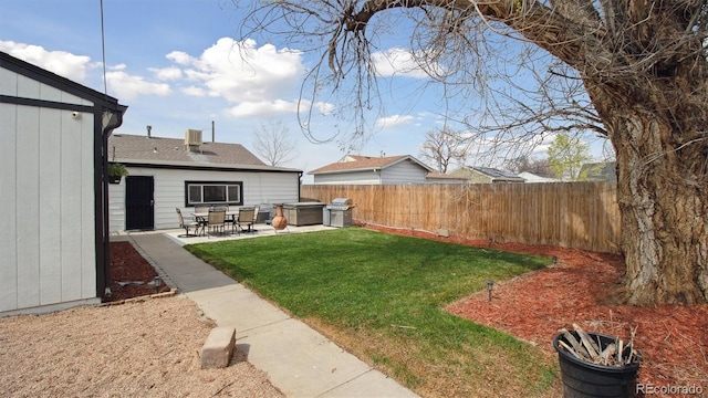 766 Fulton Ave, Brighton, CO 80601 - fenced backyard featuring a patio