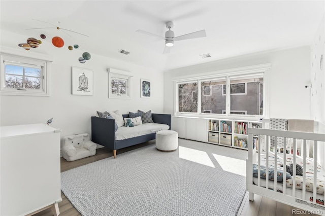 bedroom featuring visible vents and a ceiling fan