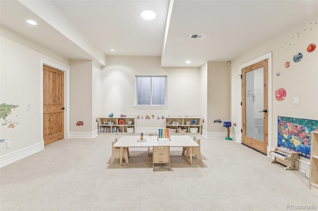 game room with carpet flooring, baseboards, and visible vents