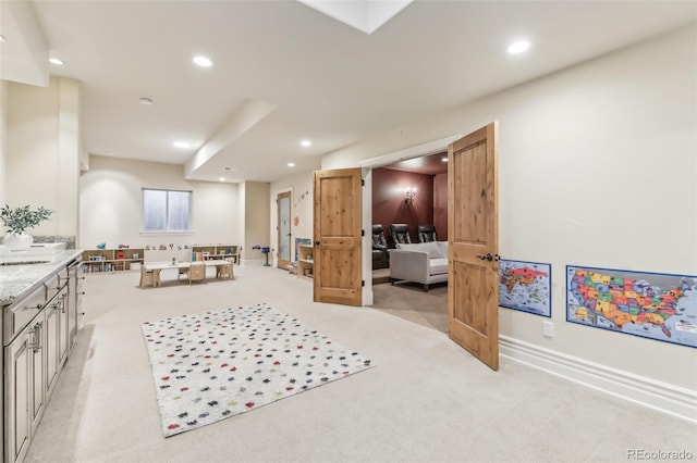 interior space with recessed lighting and baseboards