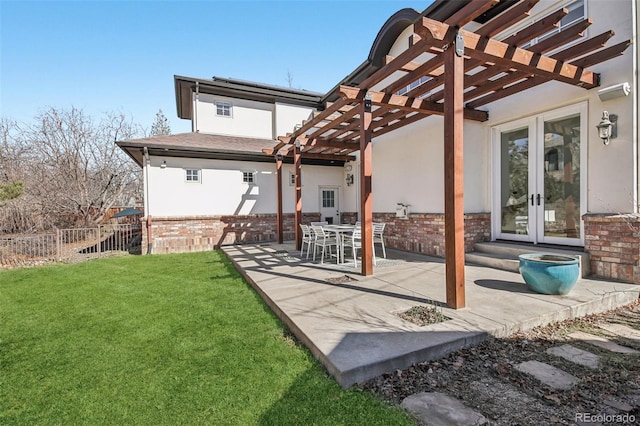 view of patio with french doors, a pergola, and fence