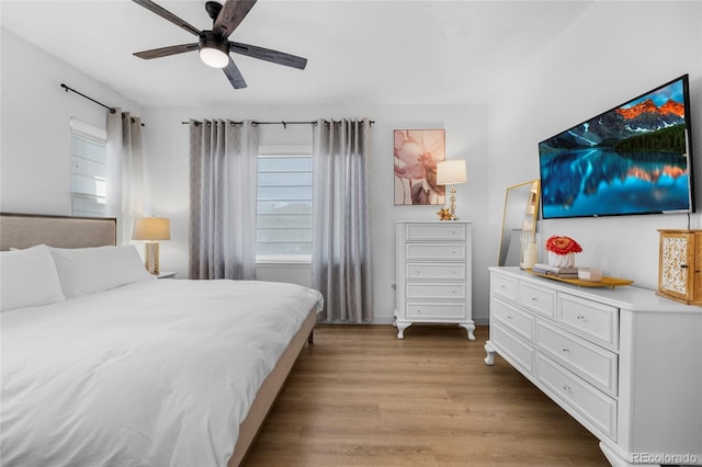 bedroom featuring ceiling fan and light wood-style floors