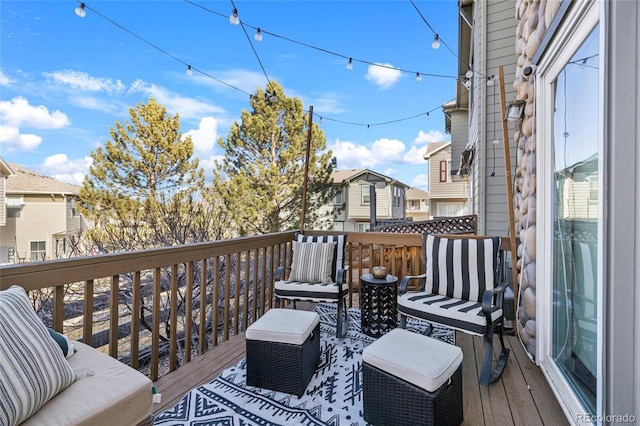 wooden deck featuring an outdoor hangout area