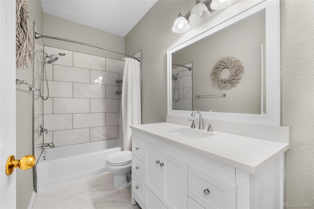 bathroom featuring marble finish floor, toilet, shower / bath combo with shower curtain, and vanity