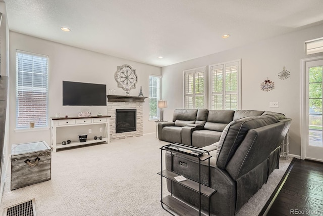 9523 Gray Ct, Westminster, CO 80031 - living room with a stone fireplace and recessed lighting